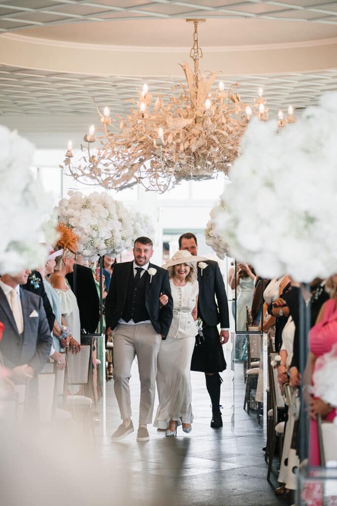 Mother of the bride walks down aisle at Old Course Hotel